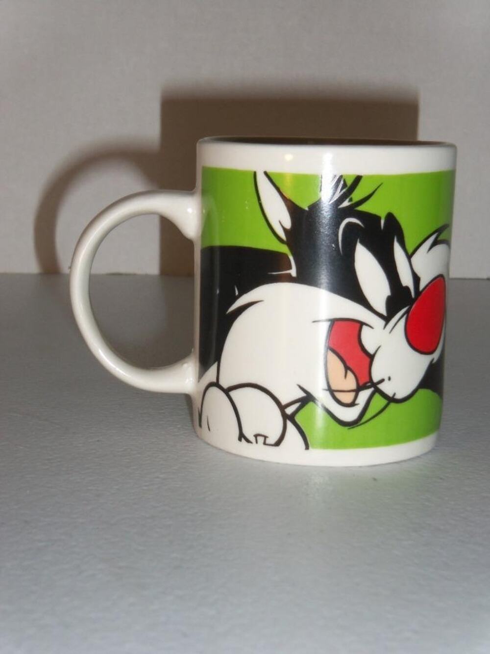 Looney Tunes Sylvester 1999 Green White Warner Bros Mug Cup Tweety Bird -061923